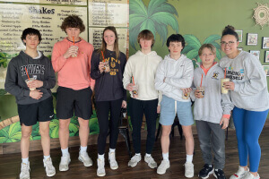 a group of teenagers posing together for a picture at Fresh Monkee