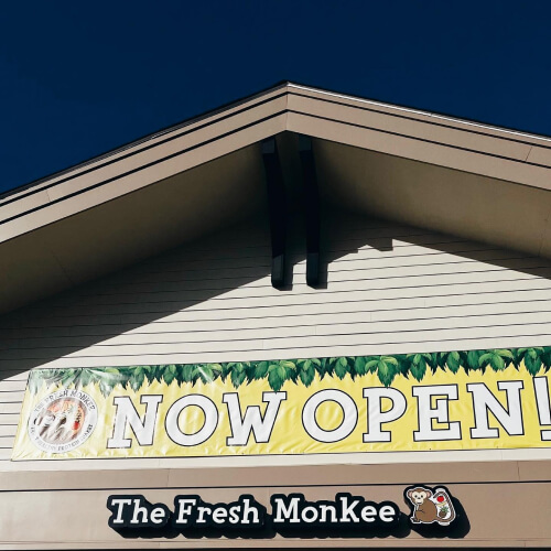 a new Fresh Monkee store with the Now Open banner at the storefront